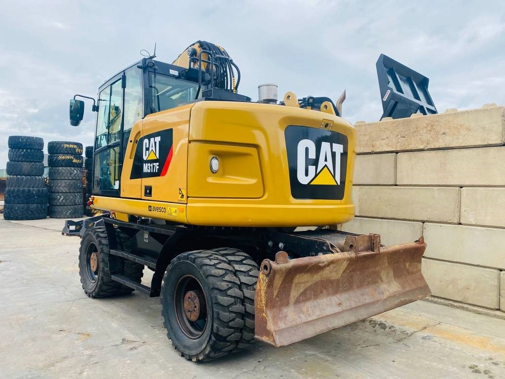 CAT m317f - Ekskavator roda: gambar 5 CAT m317f - Ekskavator roda: gambar 5