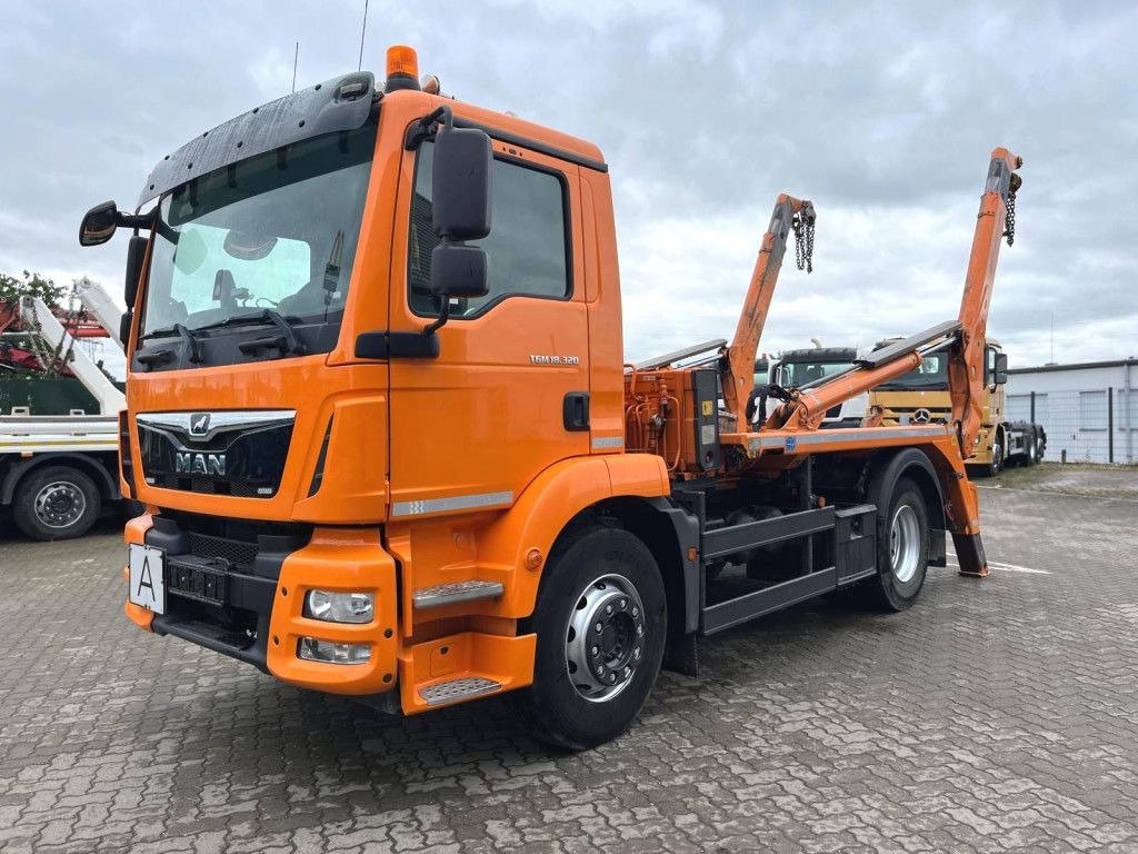 MAN TG-M 18.320 4x2 Absetzkipper Meiller, Funk, 98TK - Truk skip loader: gambar 1 MAN TG-M 18.320 4x2 Absetzkipper Meiller, Funk, 98TK - Truk skip loader: gambar 1