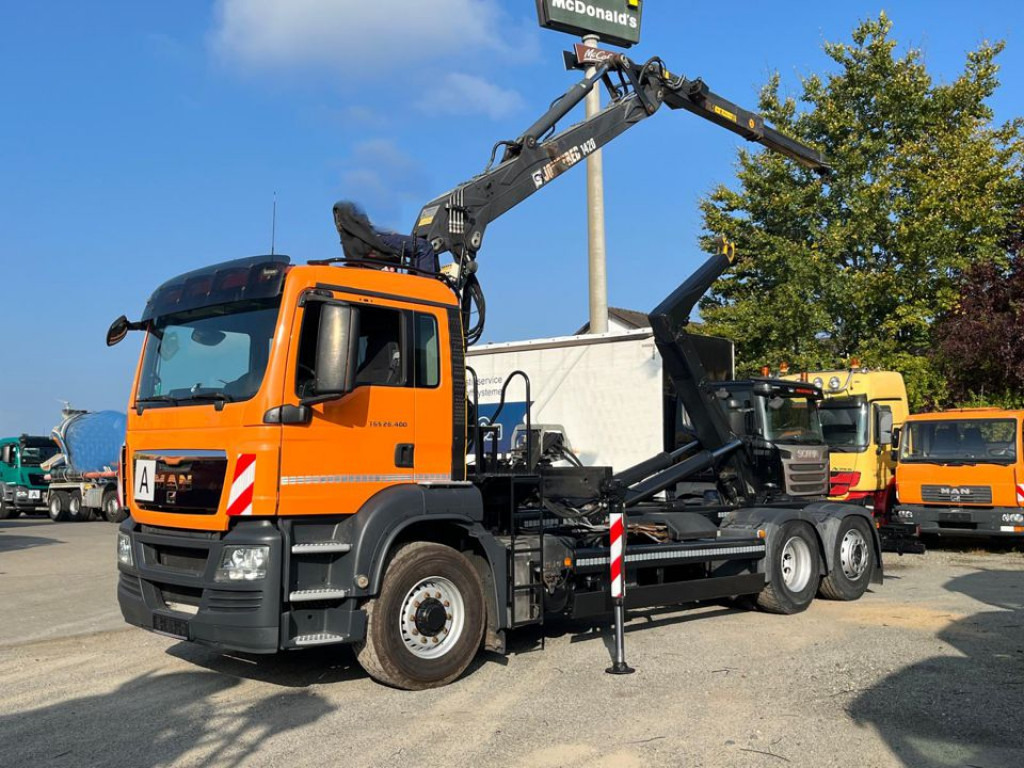 MAN TG-S 26.400 6x4H-2 BL Abrollkipper mit Kran Lift Lenk - Hook lift, Truk derek: gambar 1 MAN TG-S 26.400 6x4H-2 BL Abrollkipper mit Kran Lift Lenk - Hook lift, Truk derek: gambar 1
