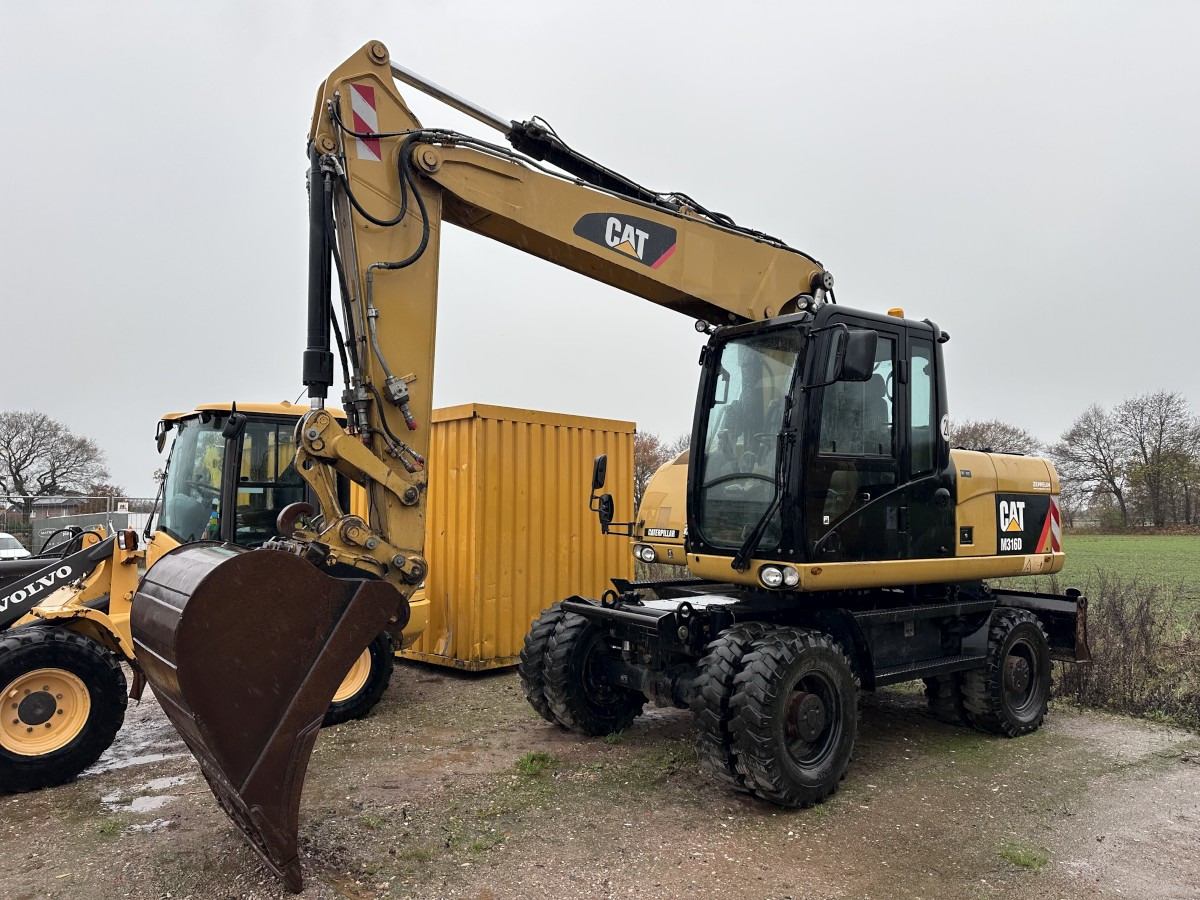 CATERPILLAR M 316 D full Hydr. Top Zustand German machine ! - Ekskavator roda: gambar 1 CATERPILLAR M 316 D full Hydr. Top Zustand German machine ! - Ekskavator roda: gambar 1