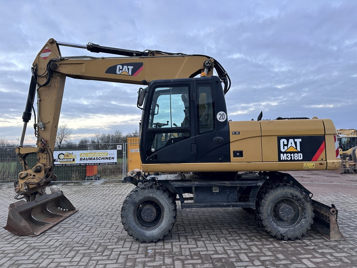 CATERPILLAR M 318 D full Hydr. Top Zustand German machine ! - Ekskavator roda: gambar 1 CATERPILLAR M 318 D full Hydr. Top Zustand German machine ! - Ekskavator roda: gambar 1