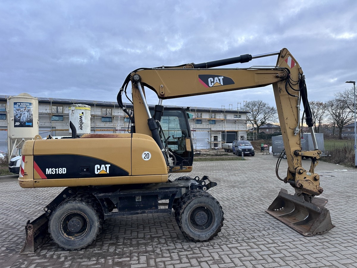 CATERPILLAR M 318 D full Hydr. Top Zustand German machine ! - Ekskavator roda: gambar 2 CATERPILLAR M 318 D full Hydr. Top Zustand German machine ! - Ekskavator roda: gambar 2