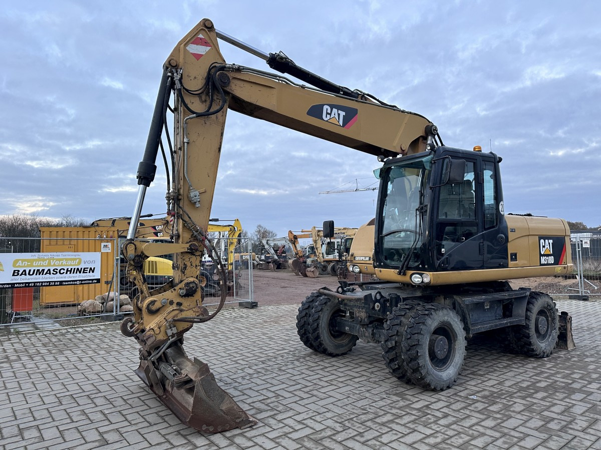 CATERPILLAR M 318 D full Hydr. Top Zustand German machine ! - Ekskavator roda: gambar 4 CATERPILLAR M 318 D full Hydr. Top Zustand German machine ! - Ekskavator roda: gambar 4