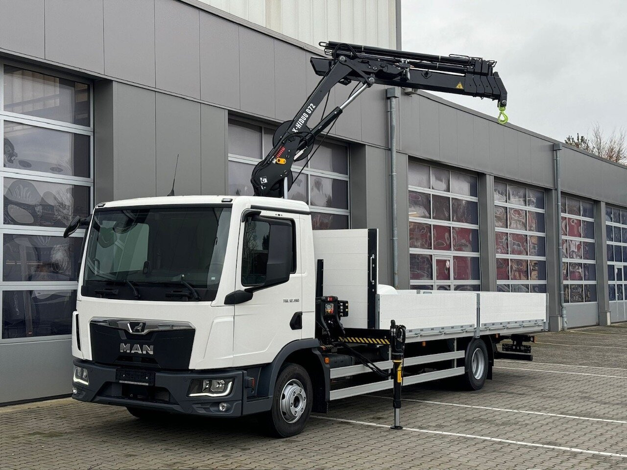 MAN TGL 12.190 4x2 BL TGL 12.190 4x2 BL mit Kran Hiab Hiduo 072DS-4 - Truk derek: gambar 1 MAN TGL 12.190 4x2 BL TGL 12.190 4x2 BL mit Kran Hiab Hiduo 072DS-4 - Truk derek: gambar 1