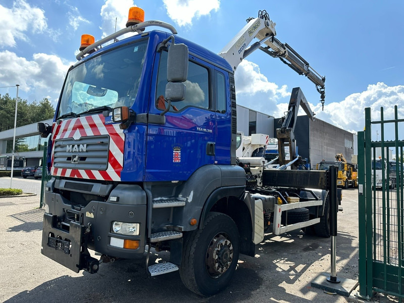 MAN TGA 18.310 4x4 HOOKLIFT + CRANE PALFINGER PK12000 - RADIO - ROTATOR - STEEL SPRING / HUB REDUCTION - MANUAL ZF - BE TRUCK - Hook lift, Truk derek: gambar 3 MAN TGA 18.310 4x4 HOOKLIFT + CRANE PALFINGER PK12000 - RADIO - ROTATOR - STEEL SPRING / HUB REDUCTION - MANUAL ZF - BE TRUCK - Hook lift, Truk derek: gambar 3