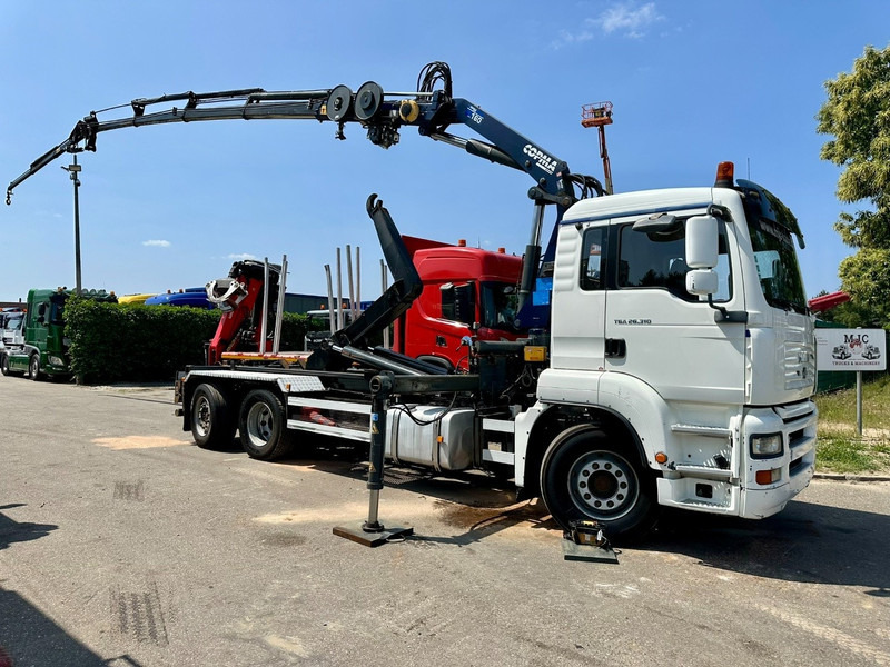 MAN TGA 26.310 6X2 HOOKLIFT + CRANE COPMA 160.4 + JIB J2 + WINCH - RADIO - LIFT + STEERING AXLE - EURO 3 - BE - Hook lift, Truk derek: gambar 1 MAN TGA 26.310 6X2 HOOKLIFT + CRANE COPMA 160.4 + JIB J2 + WINCH - RADIO - LIFT + STEERING AXLE - EURO 3 - BE - Hook lift, Truk derek: gambar 1