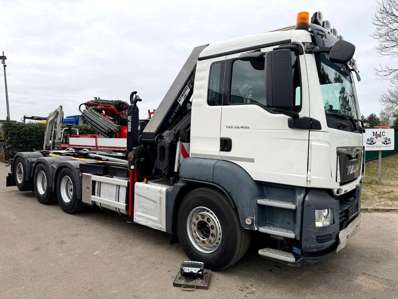 MAN TGS 35.400 8x4 HOOKLIFT + CRANE HIAB 244 EP-4 HIDUO + ROTATOR + RADIO - *NEW TIRES* - TRIDEM LIFT + STEERING AXLE - EURO 6 - TÜV 01/2027 - BE TRUCK - Hook lift, Truk derek: gambar 2 MAN TGS 35.400 8x4 HOOKLIFT + CRANE HIAB 244 EP-4 HIDUO + ROTATOR + RADIO - *NEW TIRES* - TRIDEM LIFT + STEERING AXLE - EURO 6 - TÜV 01/2027 - BE TRUCK - Hook lift, Truk derek: gambar 2