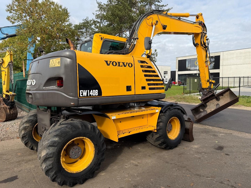 Volvo EW 140 B *FULL HYDR* - BLADE - 10.485h - TILT BUCKET - CE - NL MACHINE - GOOD CONDITION - Ekskavator roda: gambar 3 Volvo EW 140 B *FULL HYDR* - BLADE - 10.485h - TILT BUCKET - CE - NL MACHINE - GOOD CONDITION - Ekskavator roda: gambar 3