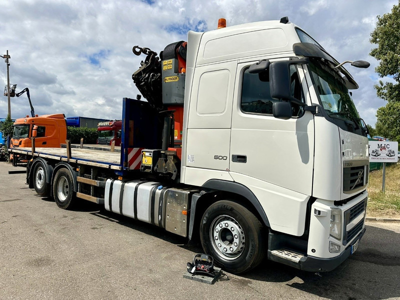 Volvo FH 500 6X2 PRITSCHE + KRAN PALFINGER PK50002 E 6x - RETARDER - PLATFORM 6m20 - TWISTLOCKS 20' - 561.000km - EURO 5 - Truk flatbed, Truk derek: gambar 1 Volvo FH 500 6X2 PRITSCHE + KRAN PALFINGER PK50002 E 6x - RETARDER - PLATFORM 6m20 - TWISTLOCKS 20' - 561.000km - EURO 5 - Truk flatbed, Truk derek: gambar 1