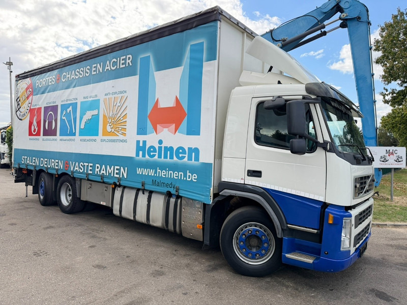 Volvo FM 370 6x2 BOX 8m15 - LIFT + STEERING AXLE - EURO 5 - I SHIFT - 26T - TÜV 06/2026 - VERY NICE CONDITION - BE TRUCK - Truk dengan terpal samping: gambar 1 Volvo FM 370 6x2 BOX 8m15 - LIFT + STEERING AXLE - EURO 5 - I SHIFT - 26T - TÜV 06/2026 - VERY NICE CONDITION - BE TRUCK - Truk dengan terpal samping: gambar 1