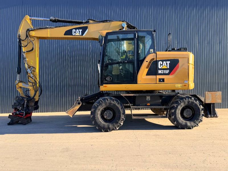Cat M315F - Rototilt - Ekskavator roda: gambar 2 Cat M315F - Rototilt - Ekskavator roda: gambar 2