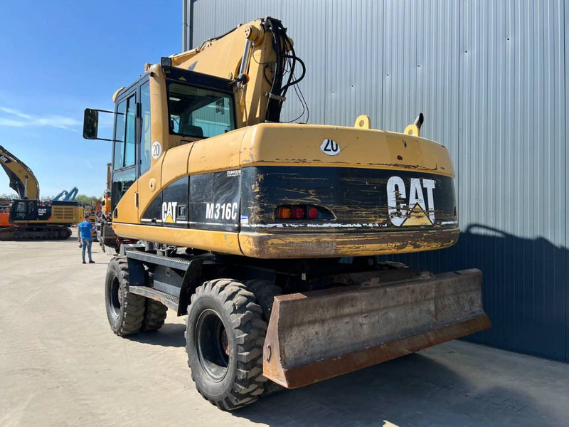 Cat M316C - Ekskavator roda: gambar 2 Cat M316C - Ekskavator roda: gambar 2