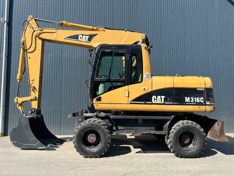 Cat M316C - Ekskavator roda: gambar 5 Cat M316C - Ekskavator roda: gambar 5