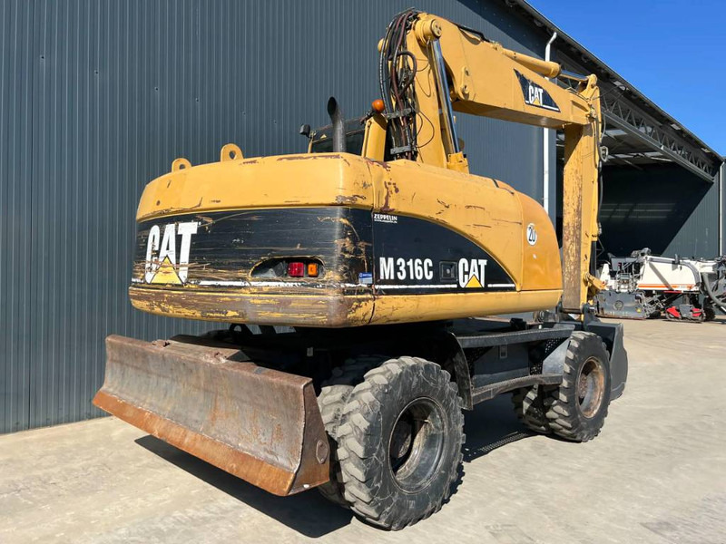 Cat M316C - Ekskavator roda: gambar 4 Cat M316C - Ekskavator roda: gambar 4
