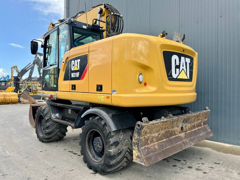 Cat M318F - Ekskavator roda: gambar 3 Cat M318F - Ekskavator roda: gambar 3