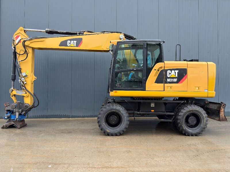 Cat M318F - Ekskavator roda: gambar 2 Cat M318F - Ekskavator roda: gambar 2