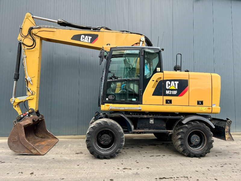 Cat M318F - Ekskavator roda: gambar 2 Cat M318F - Ekskavator roda: gambar 2