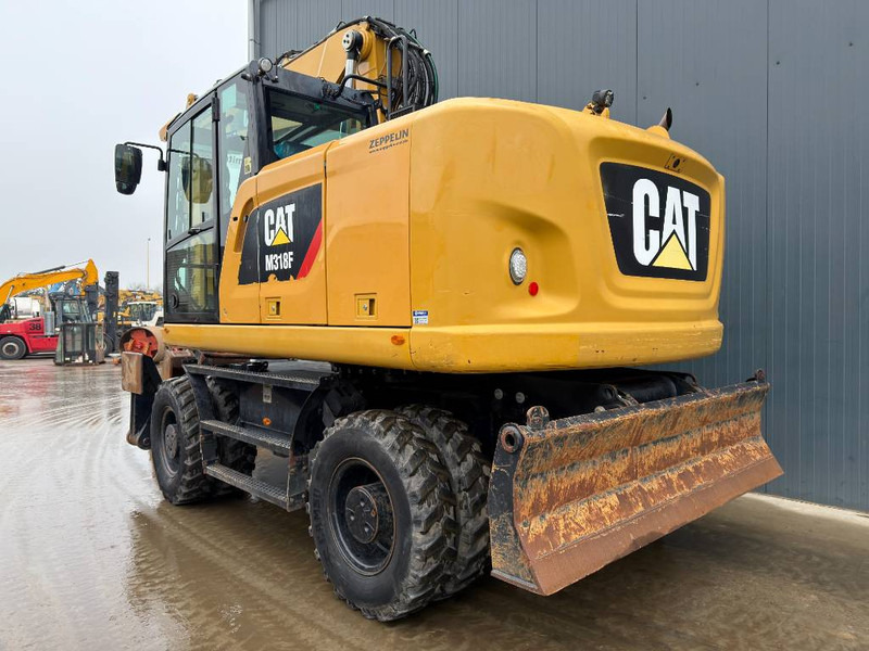 Cat M318F - Ekskavator roda: gambar 3 Cat M318F - Ekskavator roda: gambar 3