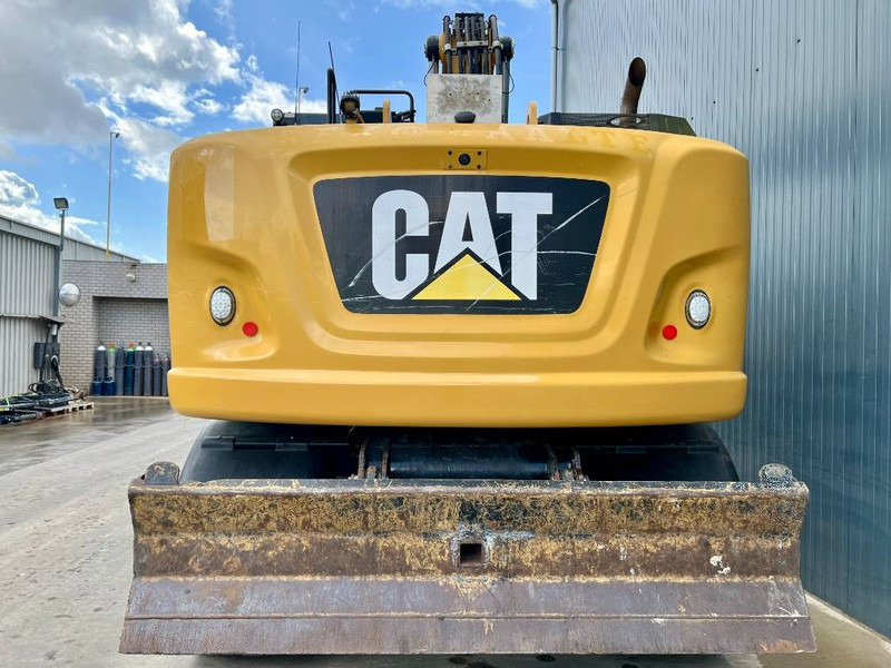 Cat M318F - Ekskavator roda: gambar 4 Cat M318F - Ekskavator roda: gambar 4