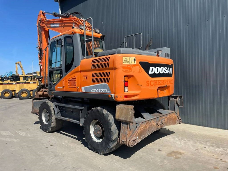 Doosan DX170W-5 - Ekskavator roda: gambar 2 Doosan DX170W-5 - Ekskavator roda: gambar 2