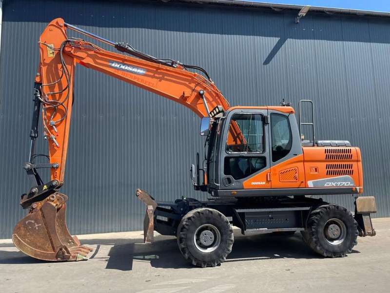 Doosan DX170W-5 - Ekskavator roda: gambar 5 Doosan DX170W-5 - Ekskavator roda: gambar 5