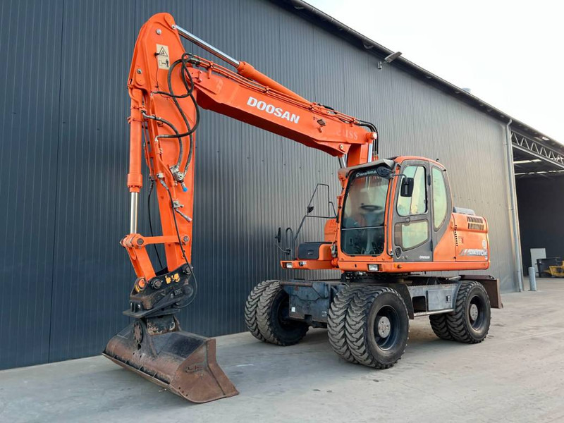 Doosan DX170W - Ekskavator roda: gambar 1 Doosan DX170W - Ekskavator roda: gambar 1