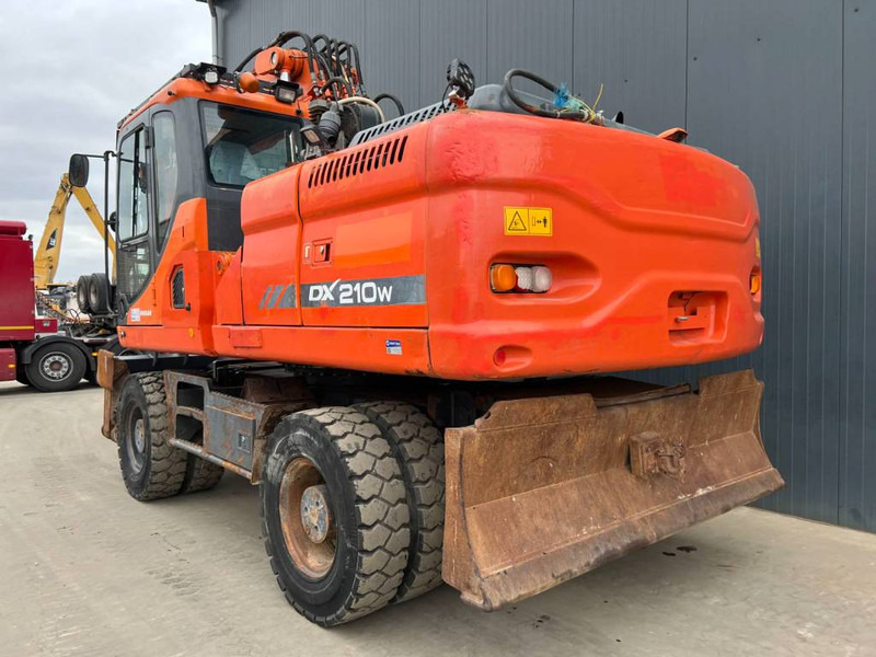 Doosan DX210W - Ekskavator roda: gambar 2 Doosan DX210W - Ekskavator roda: gambar 2