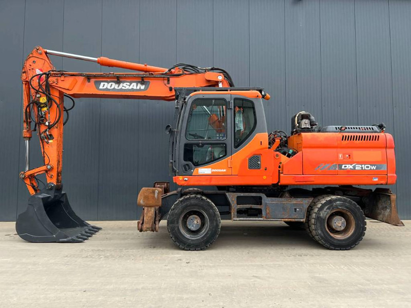 Doosan DX210W - Ekskavator roda: gambar 5 Doosan DX210W - Ekskavator roda: gambar 5
