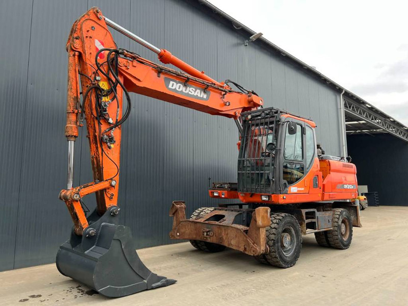 Doosan DX210W - Ekskavator roda: gambar 1 Doosan DX210W - Ekskavator roda: gambar 1