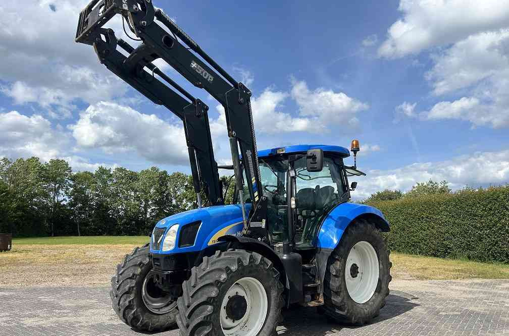 New Holland TSA 125, frontlader - Traktor: gambar 1 New Holland TSA 125, frontlader - Traktor: gambar 1