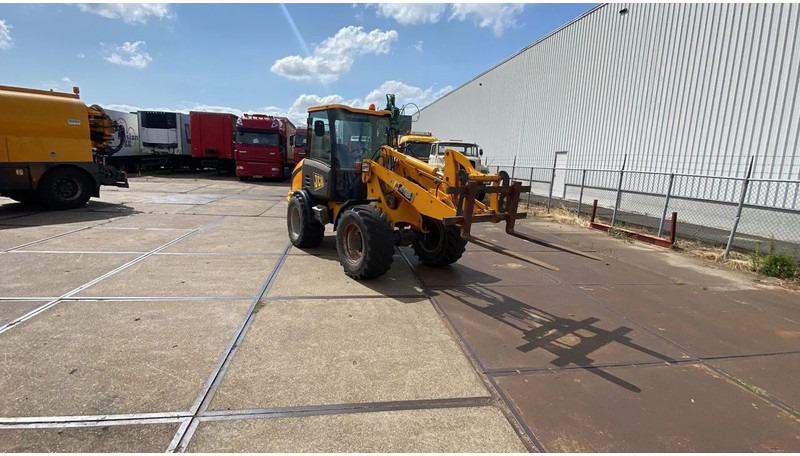 JCB KNIKSCHOVEL 406 - Wheel loader: gambar 1 JCB KNIKSCHOVEL 406 - Wheel loader: gambar 1