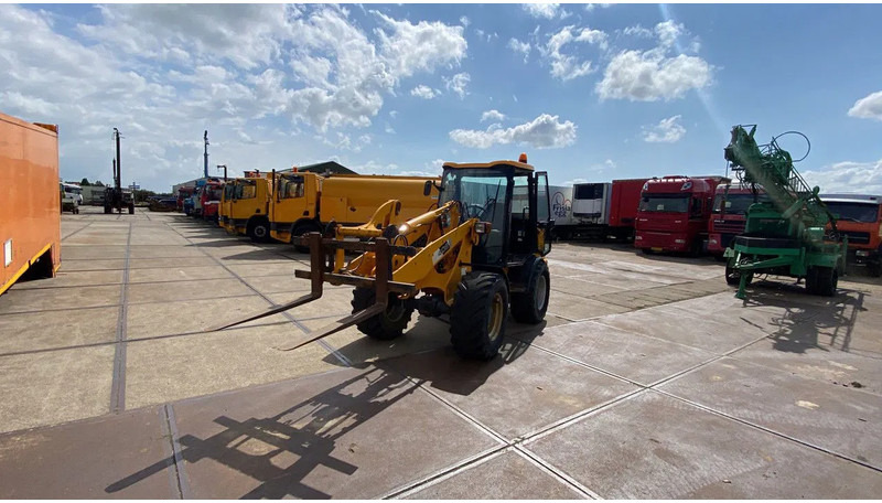 JCB KNIKSCHOVEL 406 - Wheel loader: gambar 2 JCB KNIKSCHOVEL 406 - Wheel loader: gambar 2