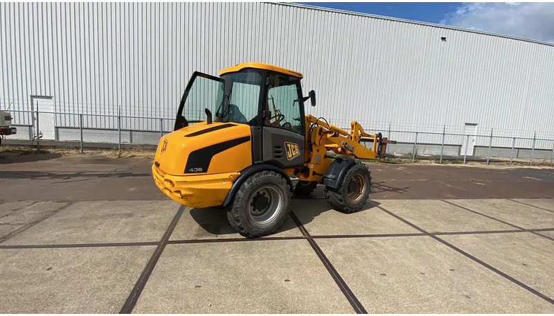 JCB KNIKSCHOVEL 406 - Wheel loader: gambar 4 JCB KNIKSCHOVEL 406 - Wheel loader: gambar 4