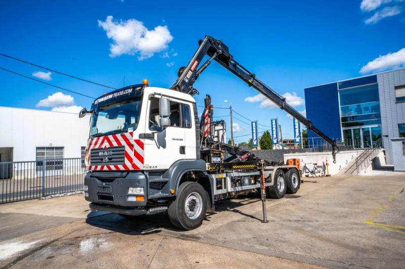 MAN TGA 26.320 BL -6X2-4+HIAB 122 E3 HIDUO - Hook lift, Truk derek: gambar 1 MAN TGA 26.320 BL -6X2-4+HIAB 122 E3 HIDUO - Hook lift, Truk derek: gambar 1