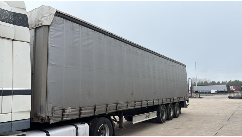 Fliegl SDS350 (BPW AXLES / DISK BRAKES) - Semi-trailer dengan terpal samping: gambar 1 Fliegl SDS350 (BPW AXLES / DISK BRAKES) - Semi-trailer dengan terpal samping: gambar 1