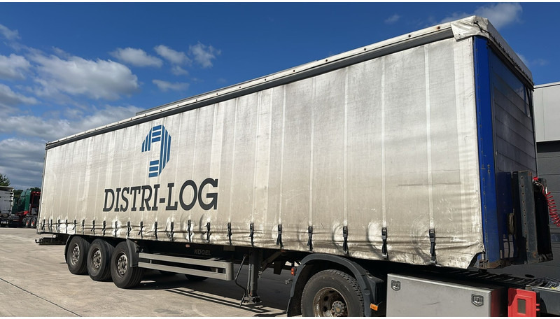 Kögel SNC 24 (BELGIAN TRAILER / BPW AXLES / DISC BRAKES) - Semi-trailer dengan terpal samping: gambar 2 Kögel SNC 24 (BELGIAN TRAILER / BPW AXLES / DISC BRAKES) - Semi-trailer dengan terpal samping: gambar 2