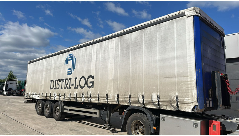 Kögel SNC 24 (BELGIAN TRAILER / BPW AXLES / DISC BRAKES) - Semi-trailer dengan terpal samping: gambar 3 Kögel SNC 24 (BELGIAN TRAILER / BPW AXLES / DISC BRAKES) - Semi-trailer dengan terpal samping: gambar 3