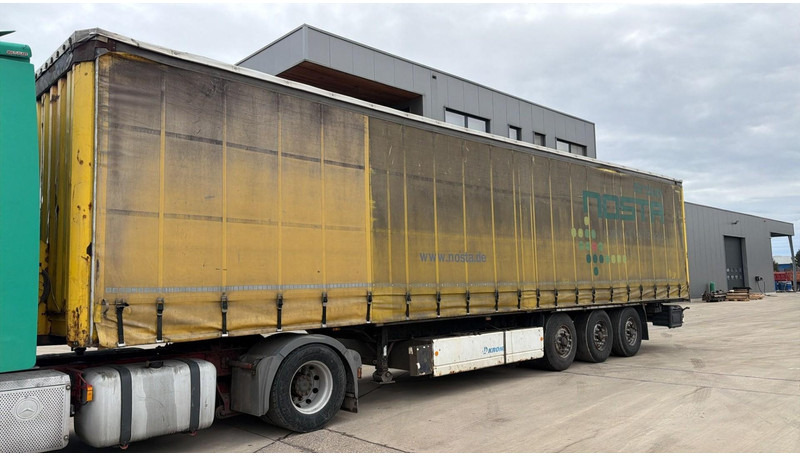 Krone BPW- (BPW AXLES / DISC BRAKES / FREINS DISQUE) - Semi-trailer dengan terpal samping: gambar 1 Krone BPW- (BPW AXLES / DISC BRAKES / FREINS DISQUE) - Semi-trailer dengan terpal samping: gambar 1