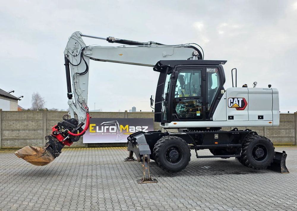 Caterpillar 318, 2021 ROK, 2200 MTH, ROTOTILT R5 - Ekskavator roda: gambar 1 Caterpillar 318, 2021 ROK, 2200 MTH, ROTOTILT R5 - Ekskavator roda: gambar 1