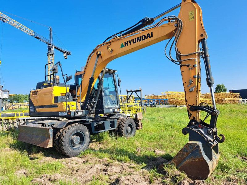 Hyundai HW 140 - Ekskavator roda: gambar 2 Hyundai HW 140 - Ekskavator roda: gambar 2