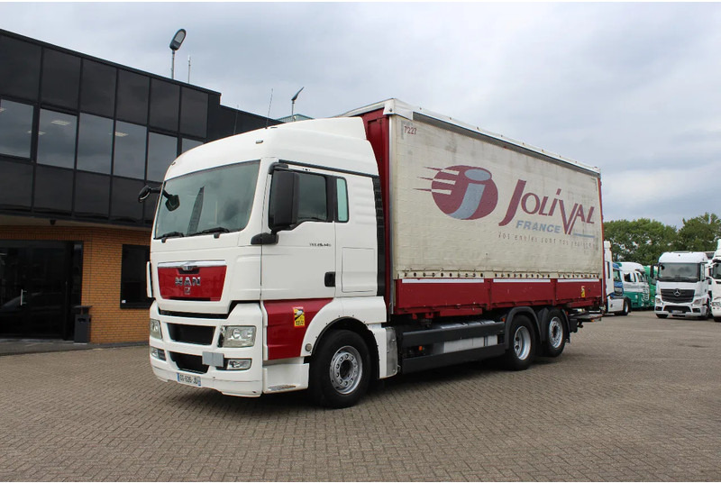 MAN TGX 26.440 * EURO5 * 6X2 * LIFT AXLE * - Truk dengan terpal samping: gambar 1 MAN TGX 26.440 * EURO5 * 6X2 * LIFT AXLE * - Truk dengan terpal samping: gambar 1