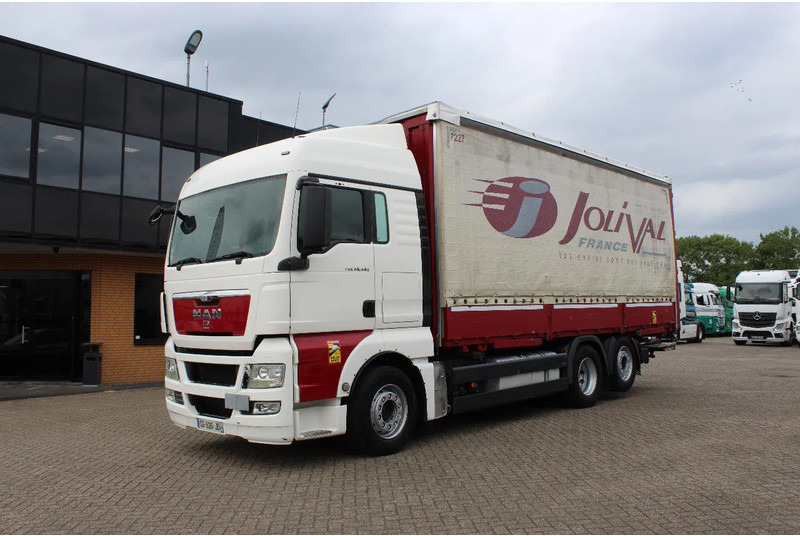 MAN TGX 26.440 * EURO5 * 6X2 * LIFT AXLE * - Truk dengan terpal samping: gambar 2 MAN TGX 26.440 * EURO5 * 6X2 * LIFT AXLE * - Truk dengan terpal samping: gambar 2