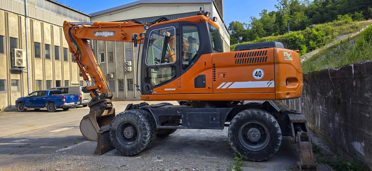 DOOSAN DX160W - Ekskavator roda: gambar 3 DOOSAN DX160W - Ekskavator roda: gambar 3