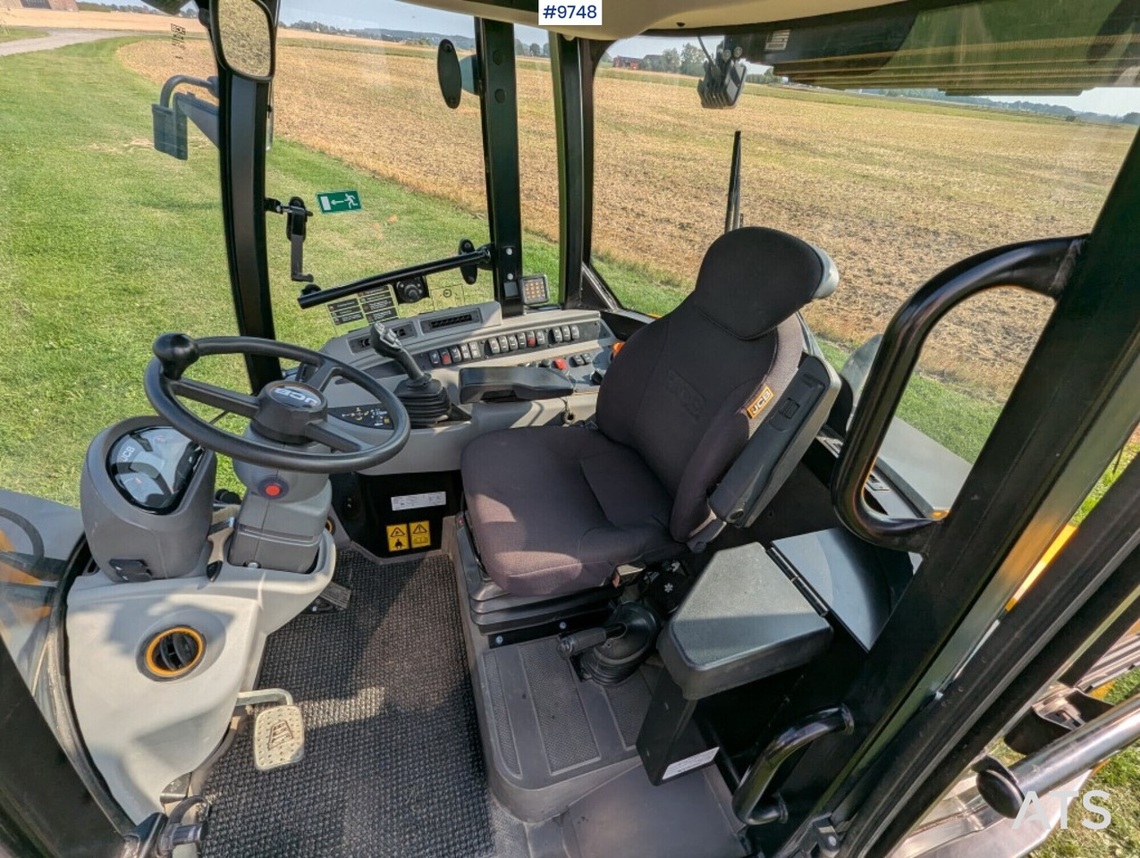 Wheel loader JCB 409 Stage V Nordic Edition 40km/h with attachments - Wheel loader: gambar 5 Wheel loader JCB 409 Stage V Nordic Edition 40km/h with attachments - Wheel loader: gambar 5