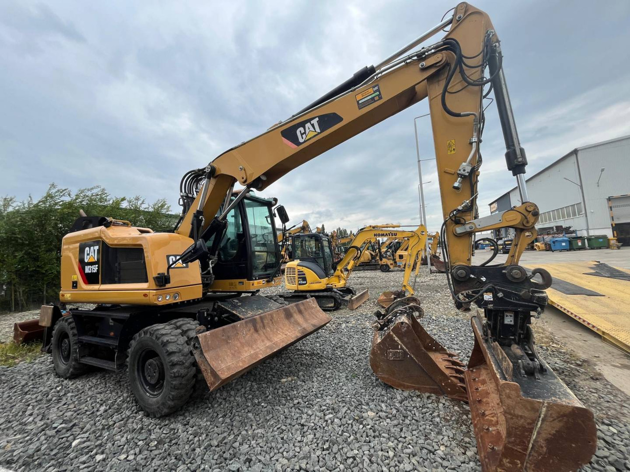 CAT M315F - Ekskavator roda: gambar 2 CAT M315F - Ekskavator roda: gambar 2