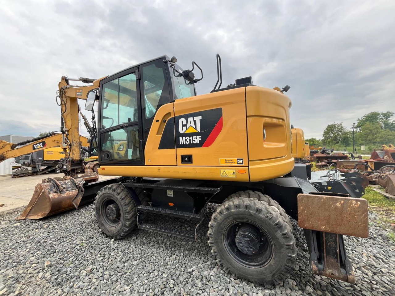 CAT M315F - Ekskavator roda: gambar 4 CAT M315F - Ekskavator roda: gambar 4