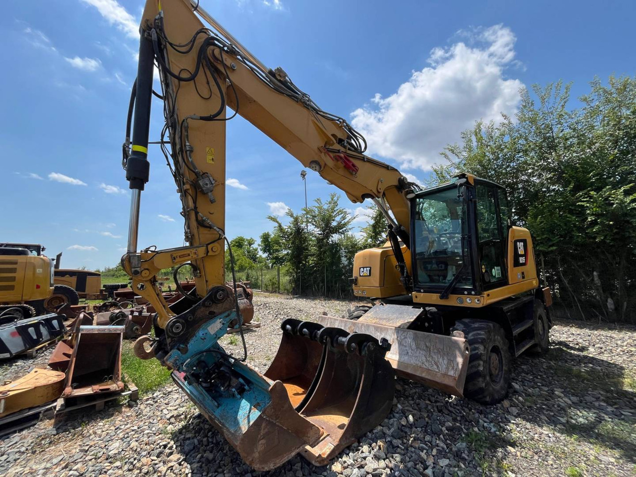 CAT M315F - Ekskavator roda: gambar 1 CAT M315F - Ekskavator roda: gambar 1