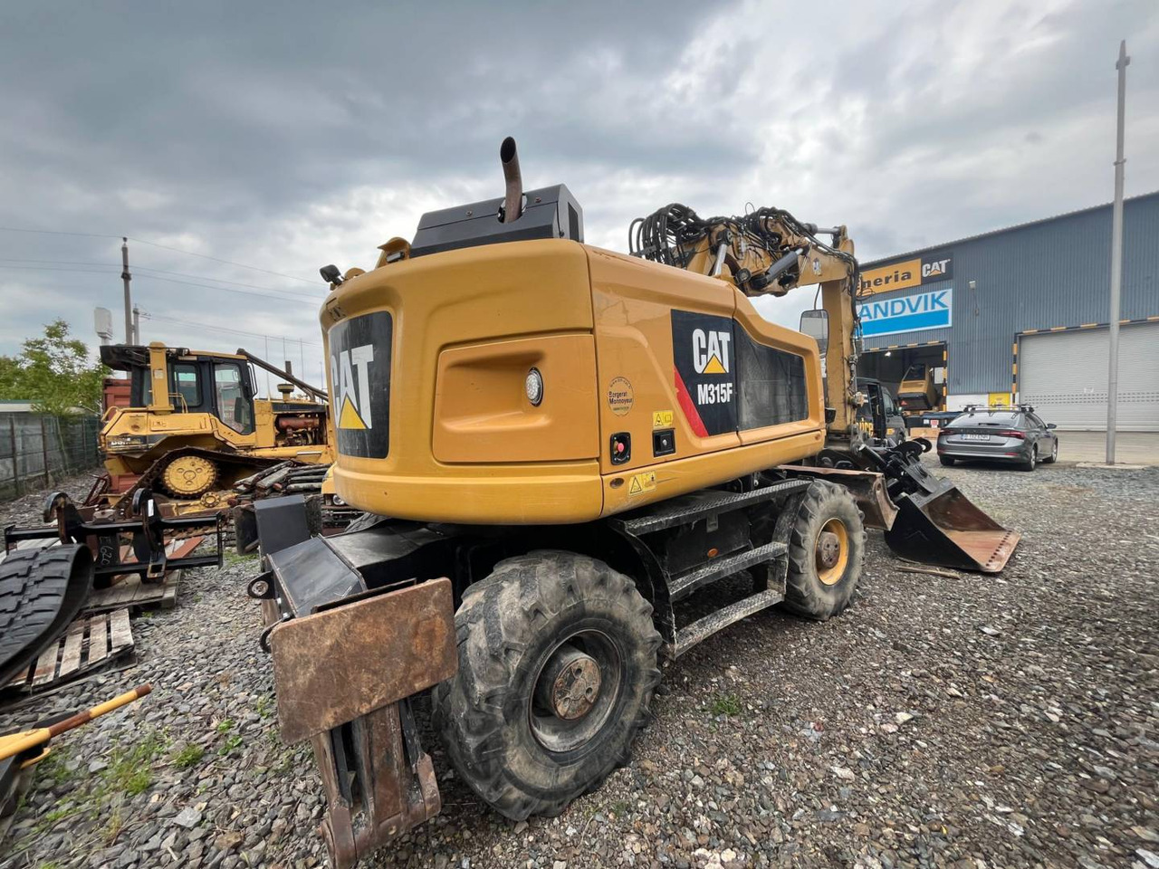 CAT M315F - Ekskavator roda: gambar 3 CAT M315F - Ekskavator roda: gambar 3