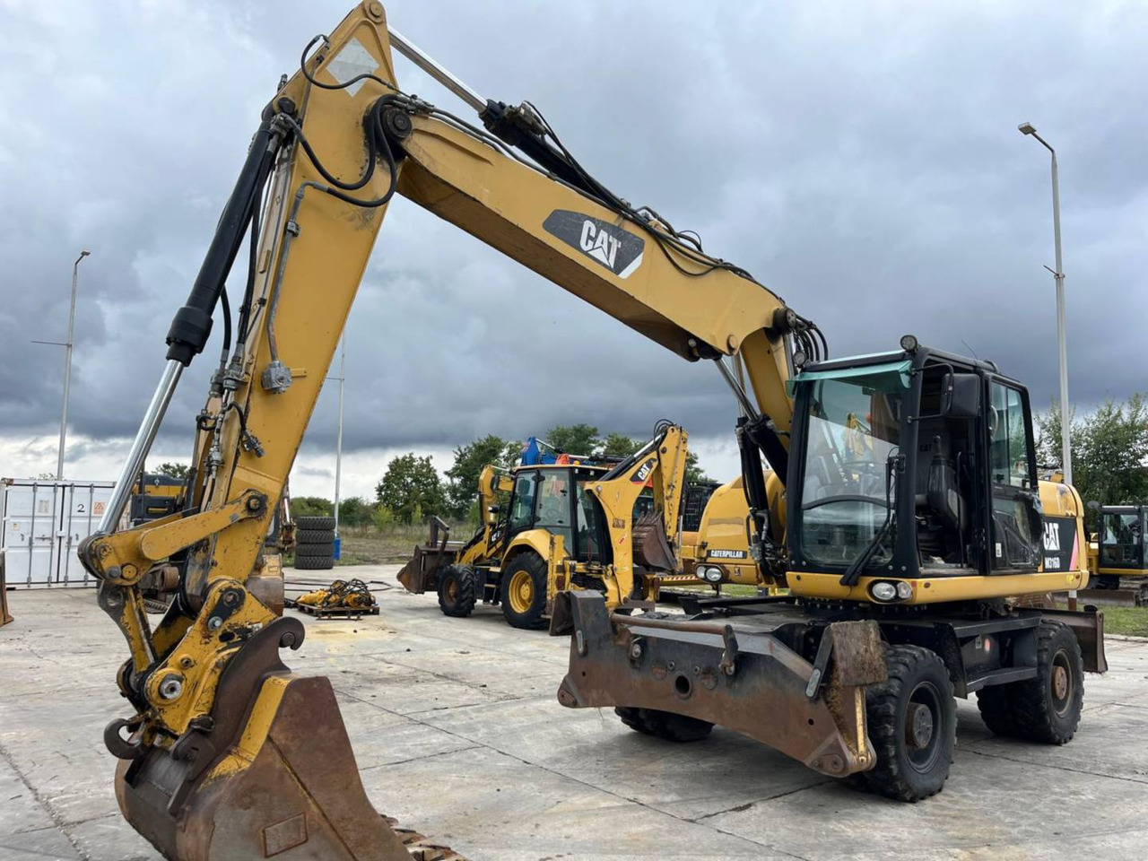 CAT M316D - Ekskavator roda: gambar 1 CAT M316D - Ekskavator roda: gambar 1
