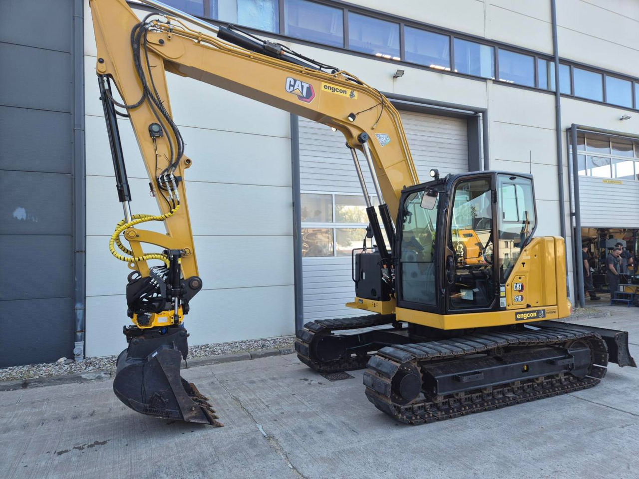CAT 310 - Ekskavator perayap: gambar 1 CAT 310 - Ekskavator perayap: gambar 1
